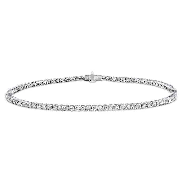 18K white gold classic 4-prong diamond line bracelet