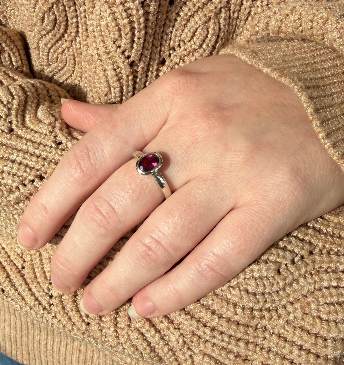 Oval pink tourmaline sterling silver bezel-set ring
