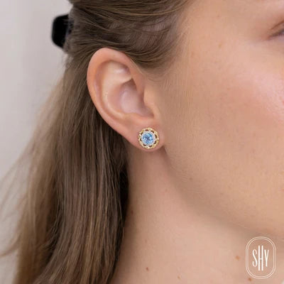 0.12CT DIAMOND & 1.29CT BLUE TOPAZ STUD EARRING