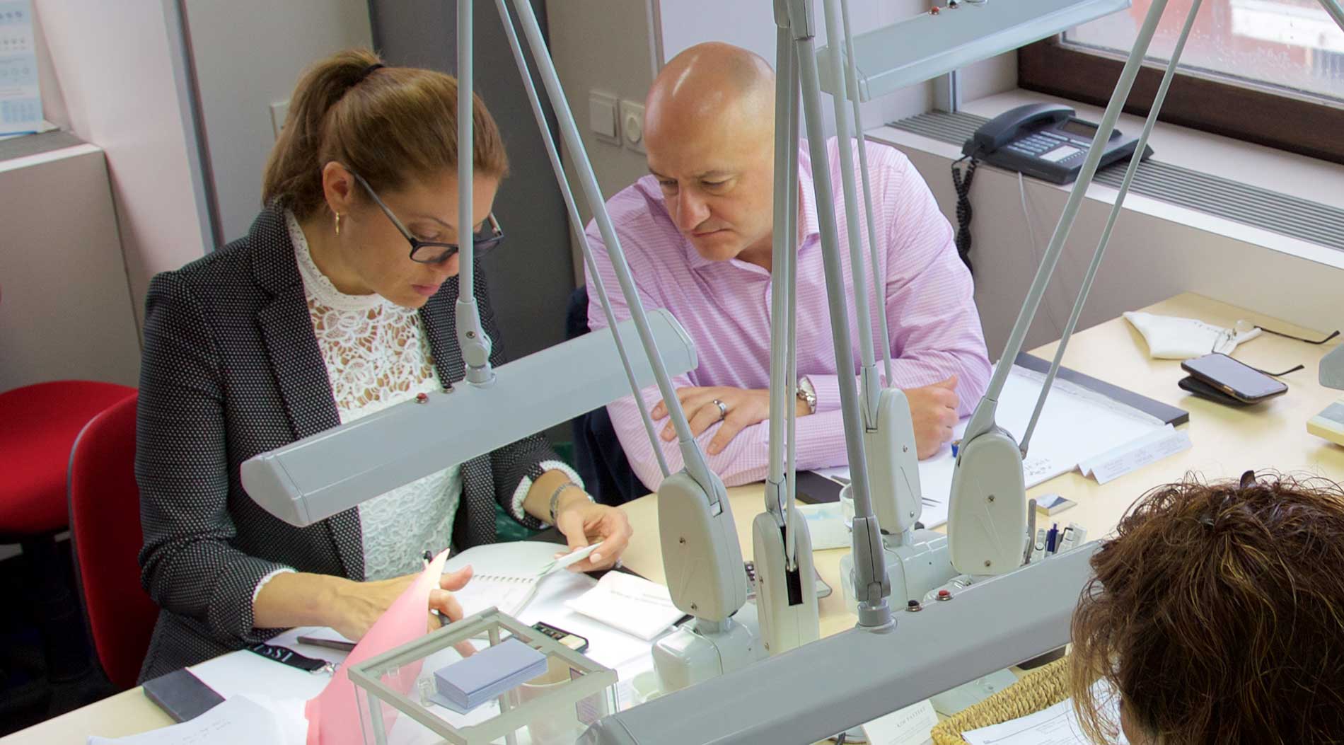 Jewelry Creations owners, Doug and Kelly Glennon, selecting diamonds in Antwerp, Belgium